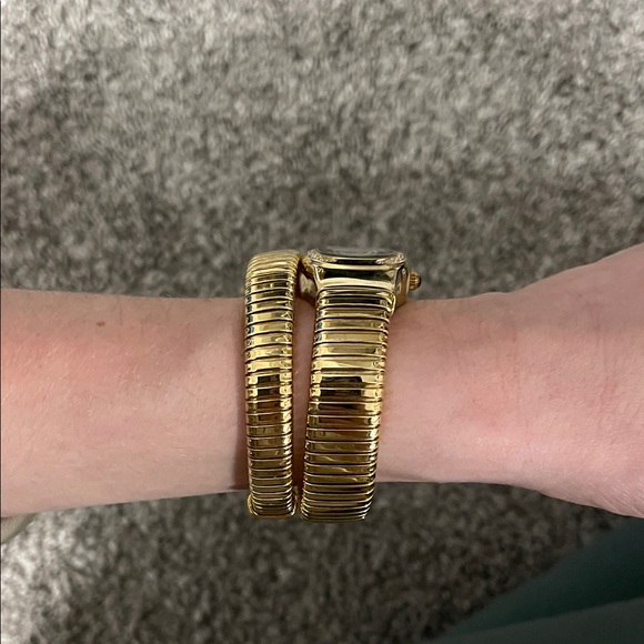 Gold Serpentine Watch with Green Dial